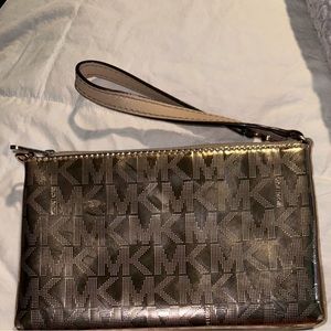 Authentic Michael kors rose gold wristlet
